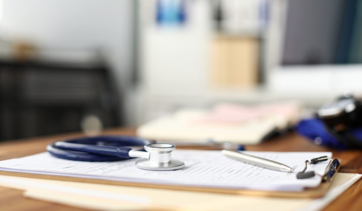 Stethoscope,Head,Lying,At,Worktable,Over,Patient,Medical,History,Paper