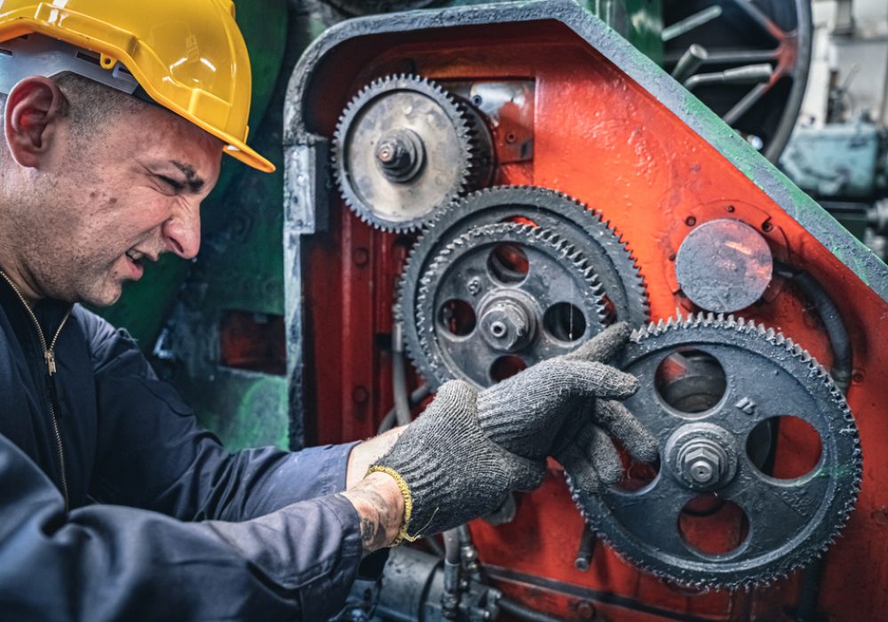 Industrial,Worker,Getting,His,Finger,Stuck,In,The,Machine.,Workplace