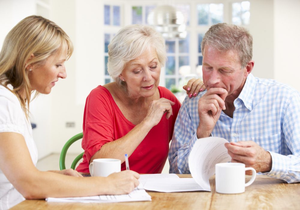 Retired,Couple,With,Financial,Advisor