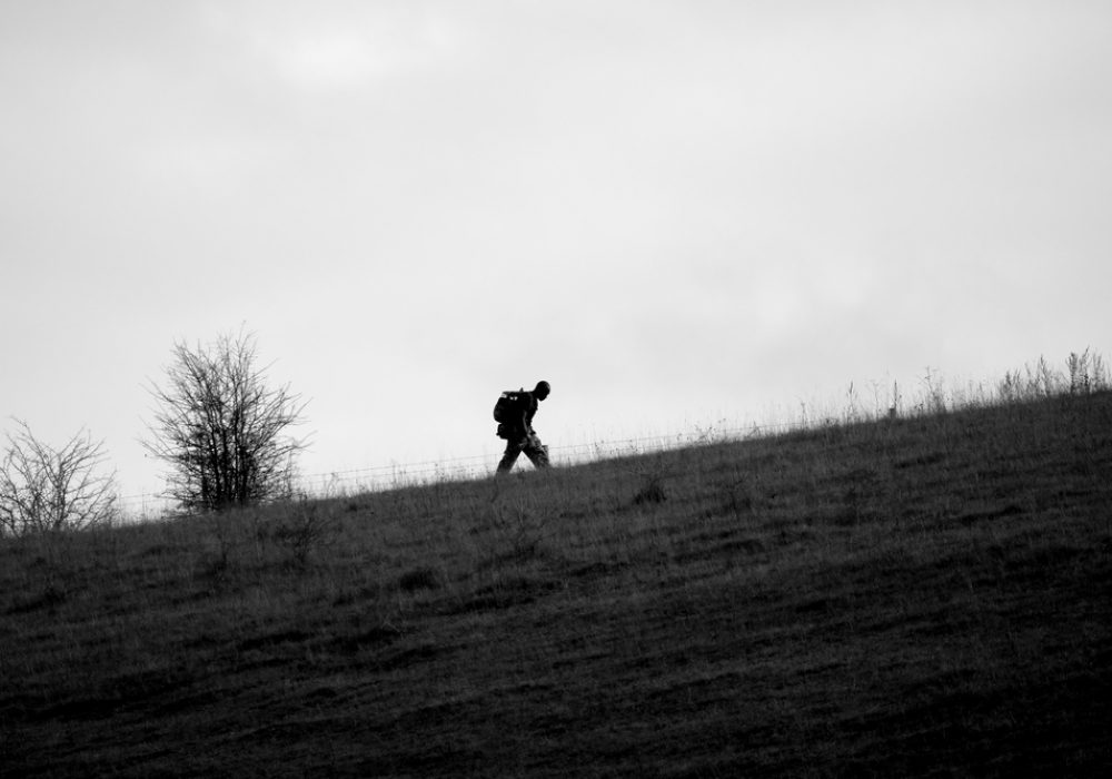 Silhouette,Of,A,British,Army,Soldier,Tabbing,Up,A,Steep