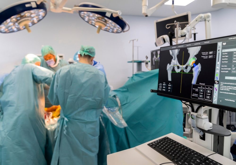 Team,Of,Doctor,Perform,Total,Hip,Arthroplasty,Replacement,Surgery,In