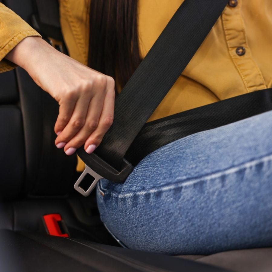 Woman,Fastening,Safety,Seat,Belt,Inside,Modern,Car,,Closeup