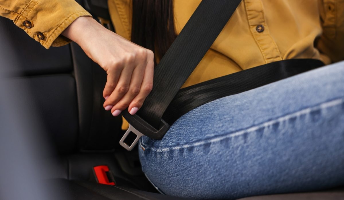 Woman,Fastening,Safety,Seat,Belt,Inside,Modern,Car,,Closeup