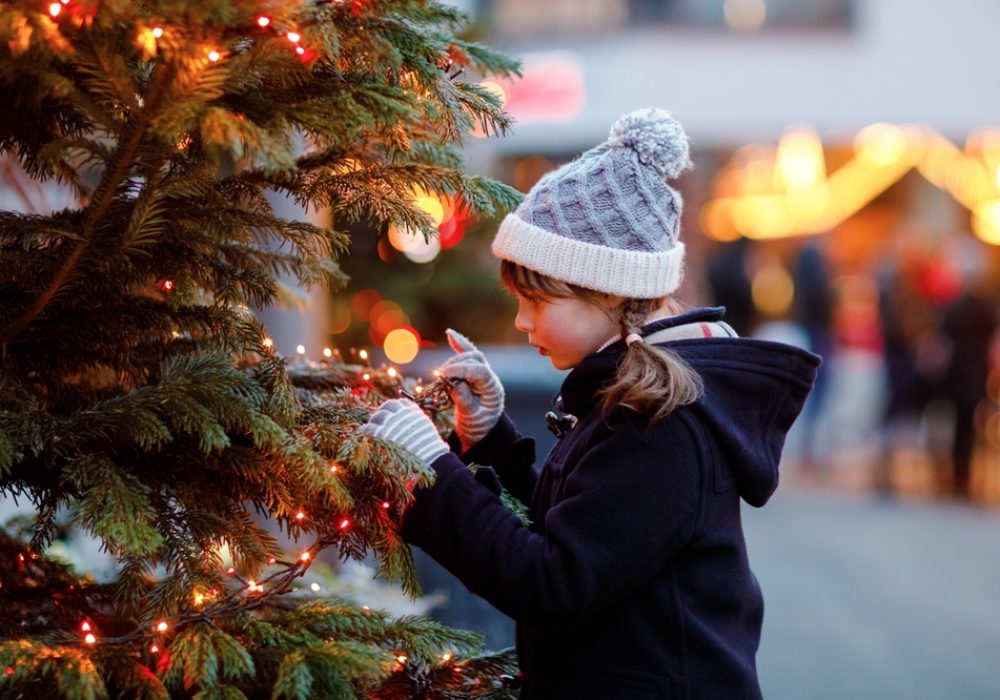 Little,Cute,Kid,Girl,Having,Fun,On,Traditional,Christmas,Market