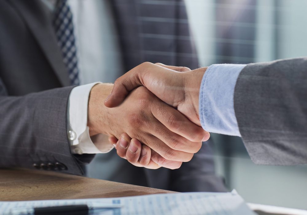Businessman,Handshake,For,Teamwork,Of,Business,Merger,And,Acquisition