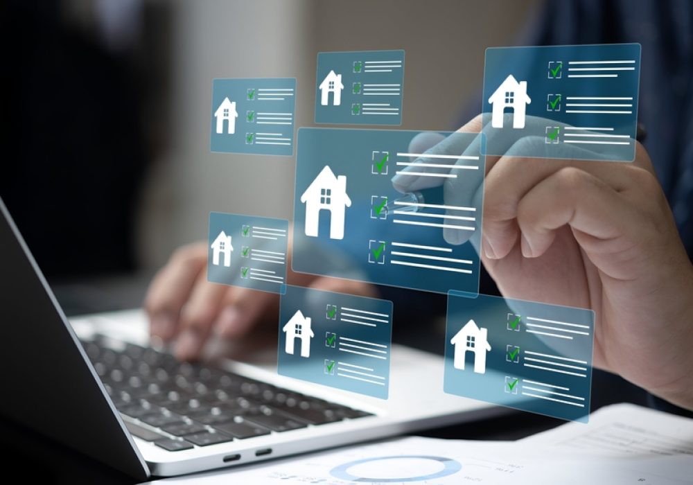 A,Business,Person,Using,Laptop,With,Real,Estate,Checklist,Concept.