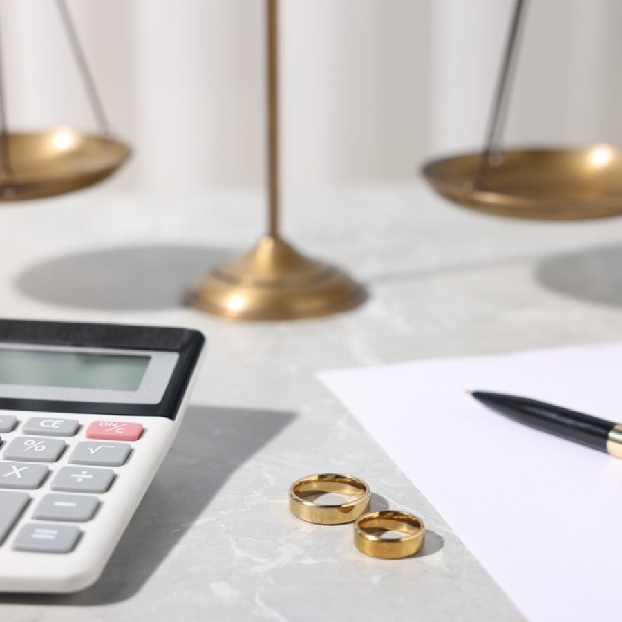 Alimony.,Wedding,Rings,,Calculator,,Document,,Pen,And,Scales,On,Grey