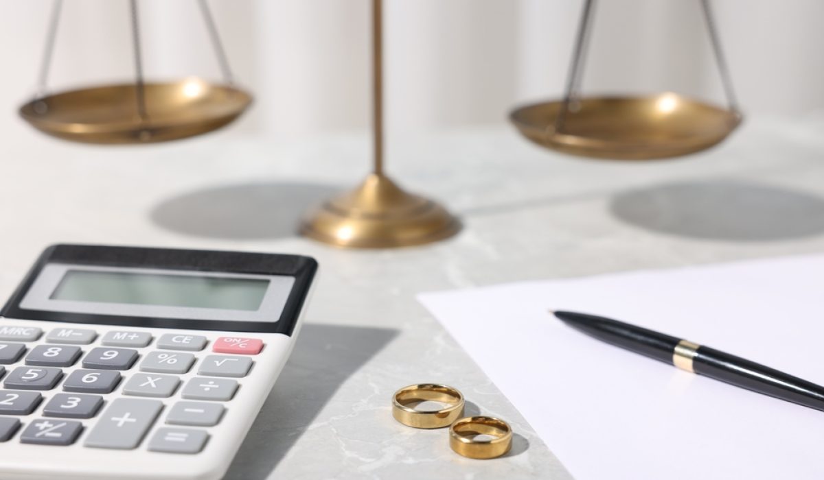 Alimony.,Wedding,Rings,,Calculator,,Document,,Pen,And,Scales,On,Grey